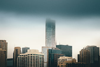 Foggy City Skyline with Skyscrapers and Urban Architecture