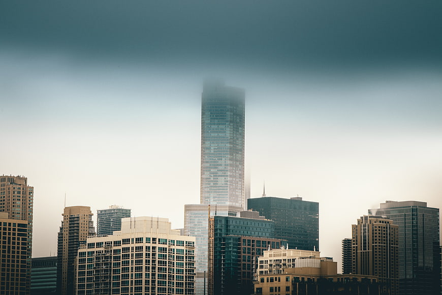 Foggy City Skyline with Skyscrapers and Urban Architecture