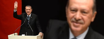 Turkish President at Podium with Blurred Close-Up Portrait Overlay