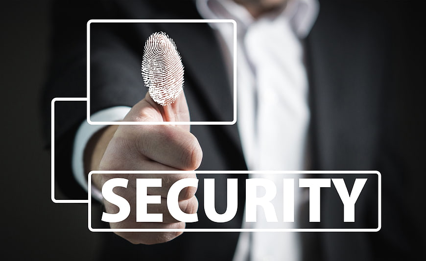 Businessman fingerprint security concept with digital overlay