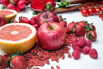 Fresh Red Fruits and Berries on White Background