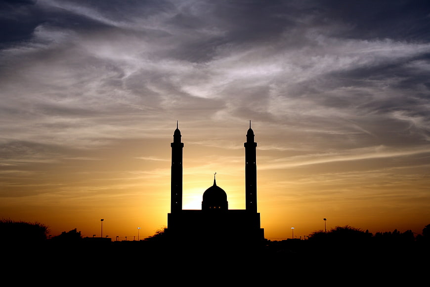 Mosque Silhouette Against Dramatic Sunset Sky