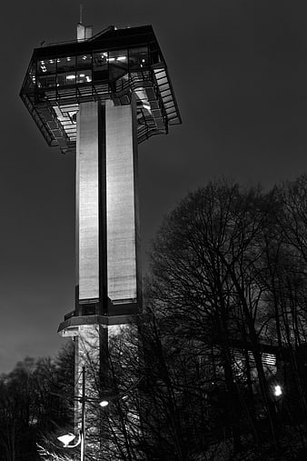 Black and white night view of modern observation tower