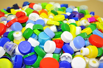 Colorful Plastic Bottle Caps Pile Recycling Concept