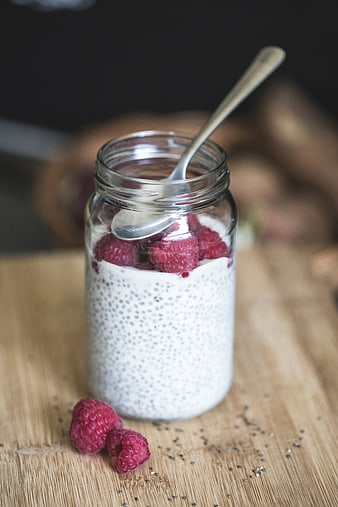 Healthy Chia Pudding with Raspberries in Glass Jar
