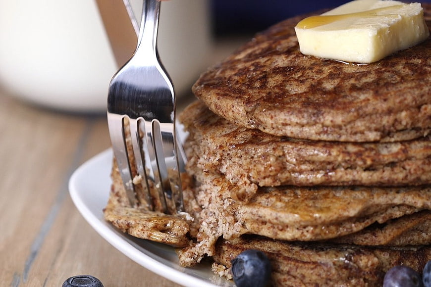 Stack of Whole Wheat Pancakes with Butter and Blueberries