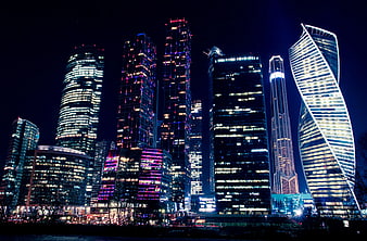 Moscow City Skyline at Night with Illuminated Skyscrapers