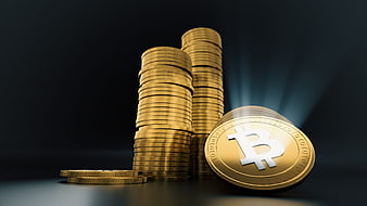 Golden Bitcoin Coins Stacked on Dark Background