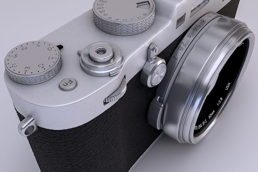 Close-up of silver vintage camera with lens details