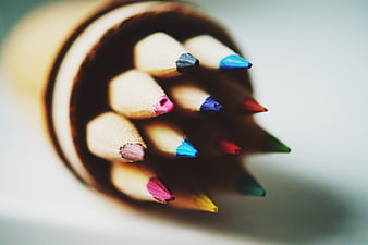 Close-up of colored pencils in a container
