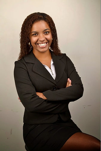 Smiling African American Businesswoman in Black Suit