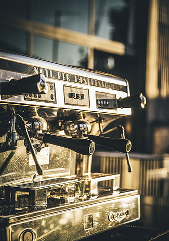 Vintage Espresso Machine Close-Up in Warm Sunlight