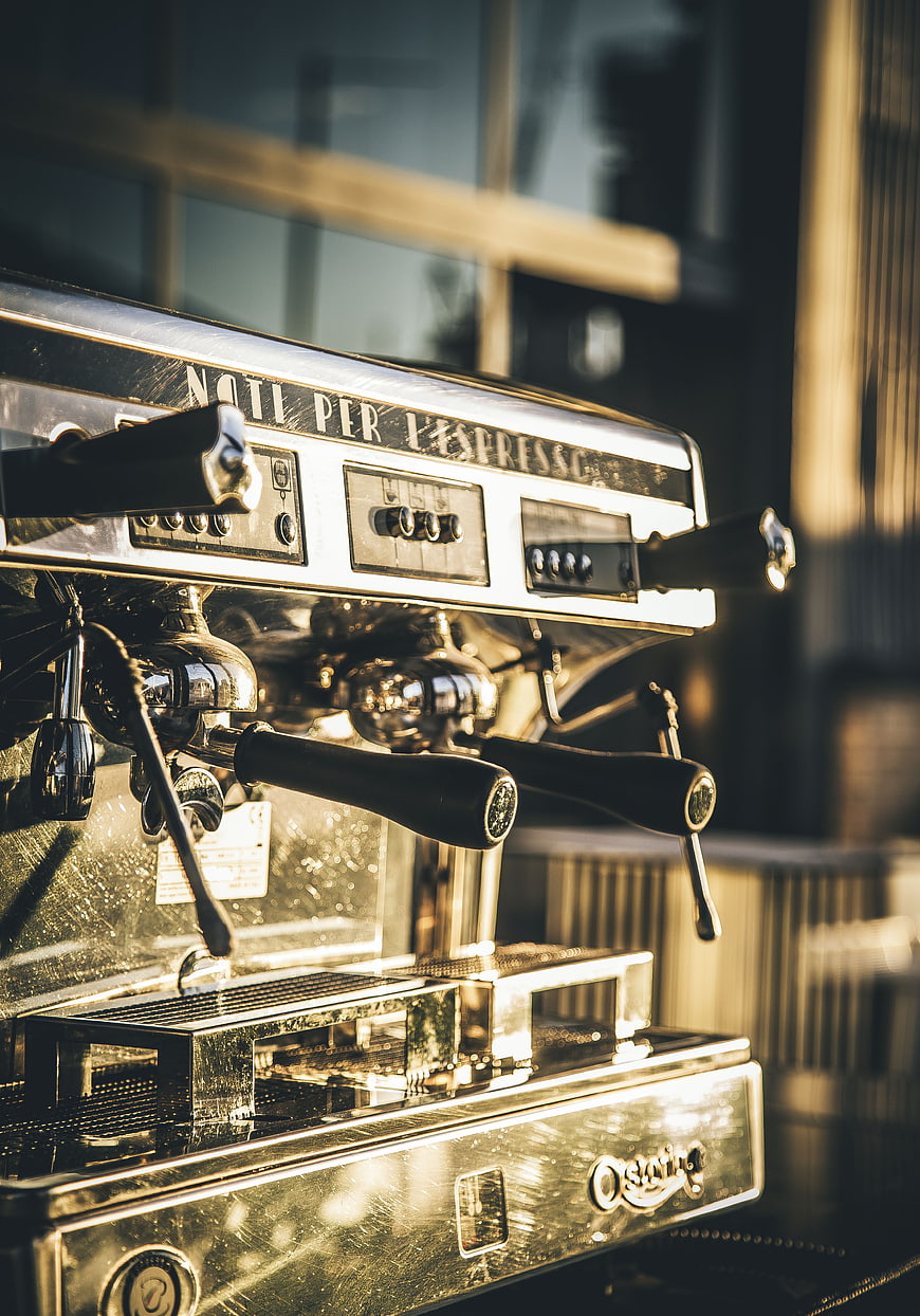 Vintage Espresso Machine Close-Up in Warm Sunlight