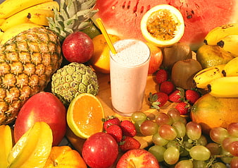 Tropical Fruit Flat Lay With Pink Smoothie And Straw On Wooden Table