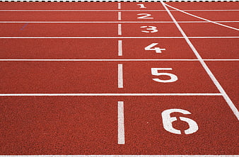 Red Running Track Lanes With White Numbers 1 To 6