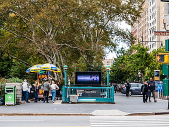 New York City Street Scene with Subway Entrance and Hot Dog Stand