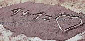 7 plus 7 equals heart drawn in cocoa powder