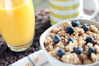 Healthy Breakfast Granola with Blueberries and Orange Juice
