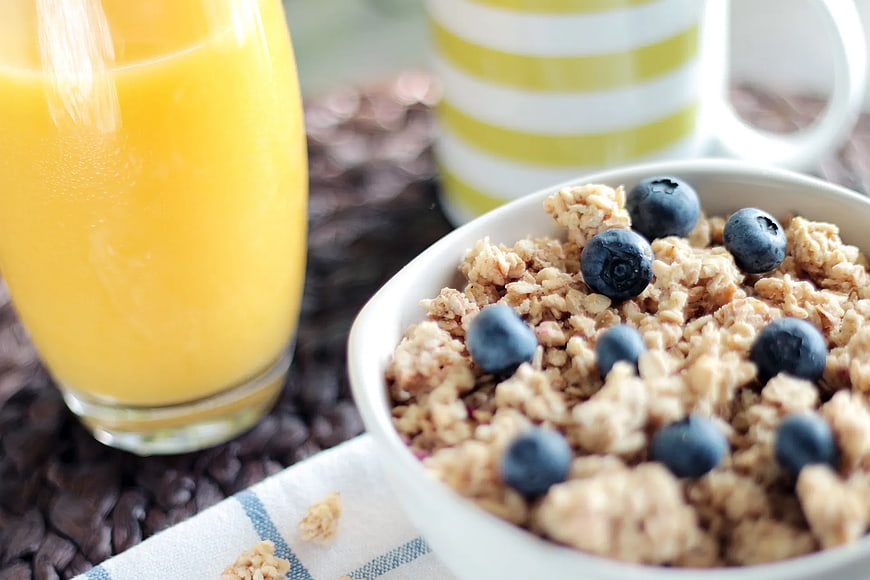 Healthy Breakfast Granola with Blueberries and Orange Juice