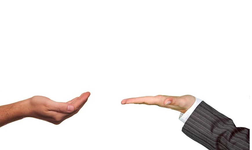 Businessman Offering Money to Customer Hand Concept