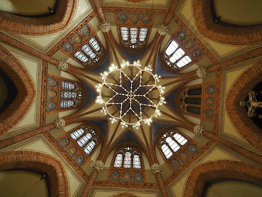 Ornate Gothic Cathedral Ceiling with Chandelier and Stained Glass