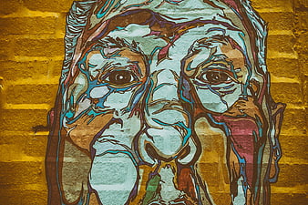 Colorful Hitchcock Street Art Mural on Brick Wall