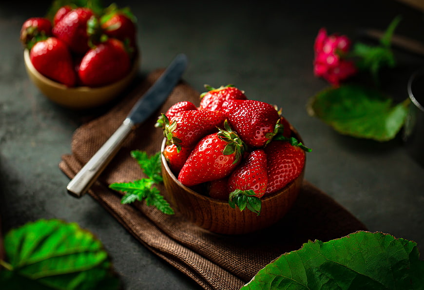 Fresh Strawberries in Wooden Bowl with Mint Leaves