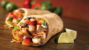 Close-up of Grilled Chicken Burrito with Rice and Peppers