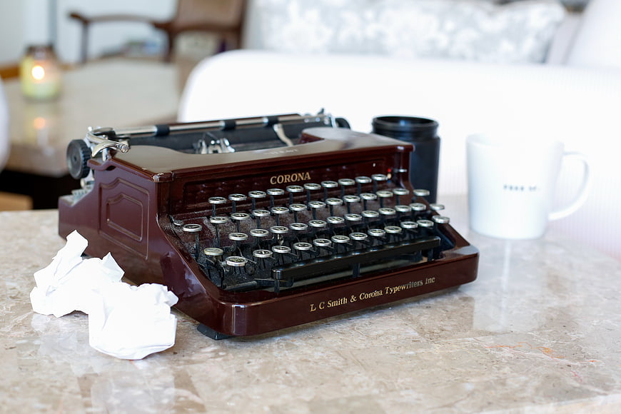 Vintage Corona Typewriter on Marble Table with Coffee