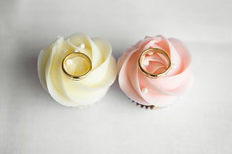 Wedding Rings on White and Pink Frosted Cupcakes