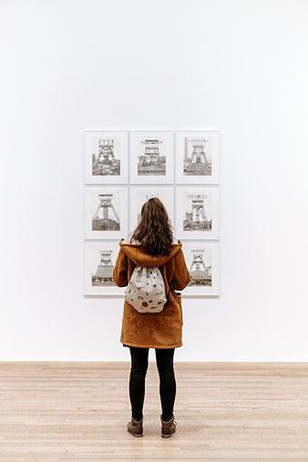 Woman Viewing Art Gallery Exhibition