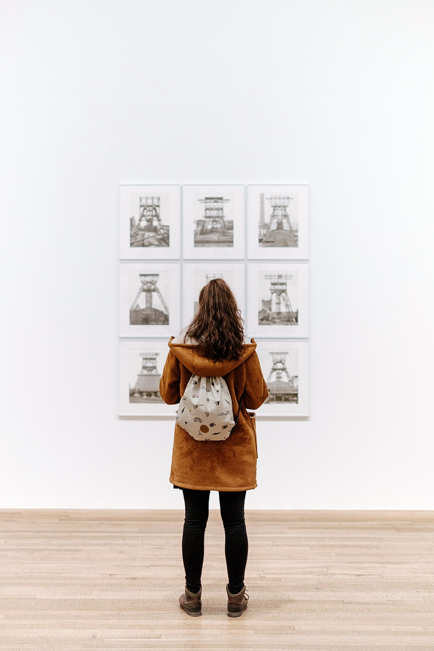 Woman Viewing Art Gallery Exhibition