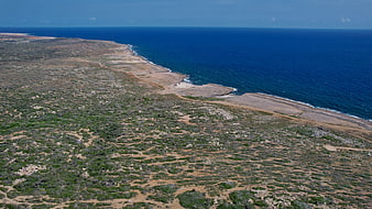 Aerial View of Rocky Mediterranean Coastline and Blue Sea