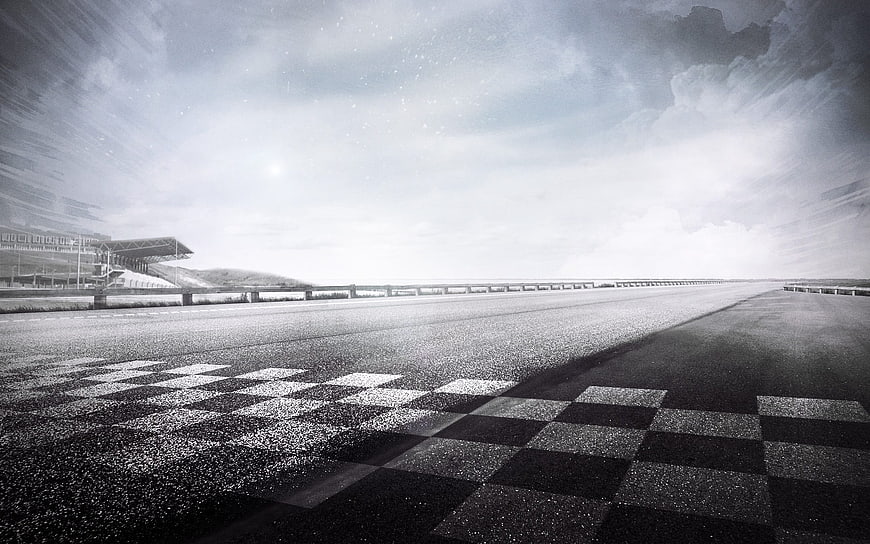 Black and white checkered finish line on a race track