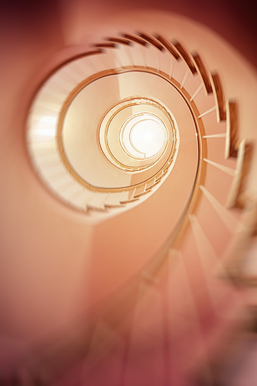 Abstract Spiral Staircase Looking Up Towards Light