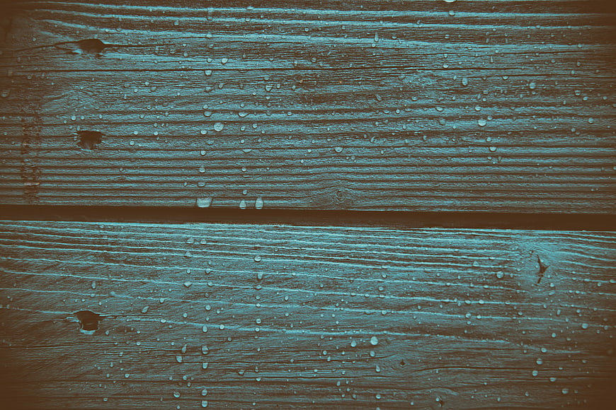 Wet Wooden Planks with Raindrops Background