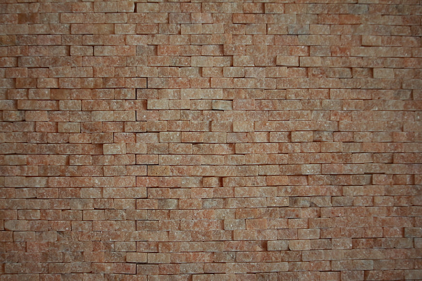 Textured Red Brick Wall Background Pattern