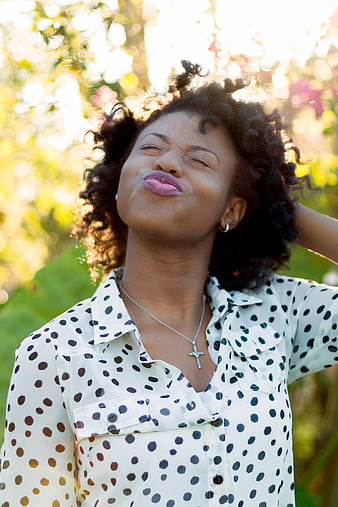 Happy African American Woman Making Kissing Face Outdoors