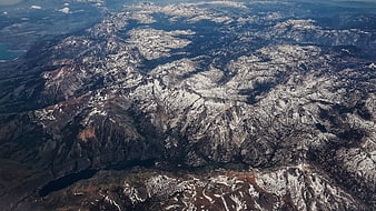 Aerial View of Snow-Capped Mountains and Lakes