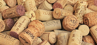 Close-up of assorted wine corks with printed labels