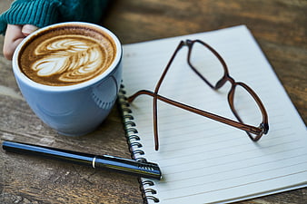 Latte Art Coffee Cup with Notebook and Glasses