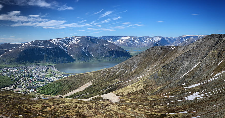 Panoramic View of Mountain Town and Fjord Landscape
