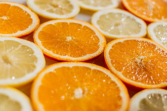 Fresh Sliced Oranges and Lemons Close Up