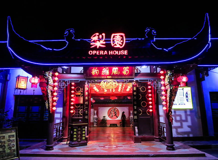 Traditional Chinese Opera House Entrance at Night with Neon Lights