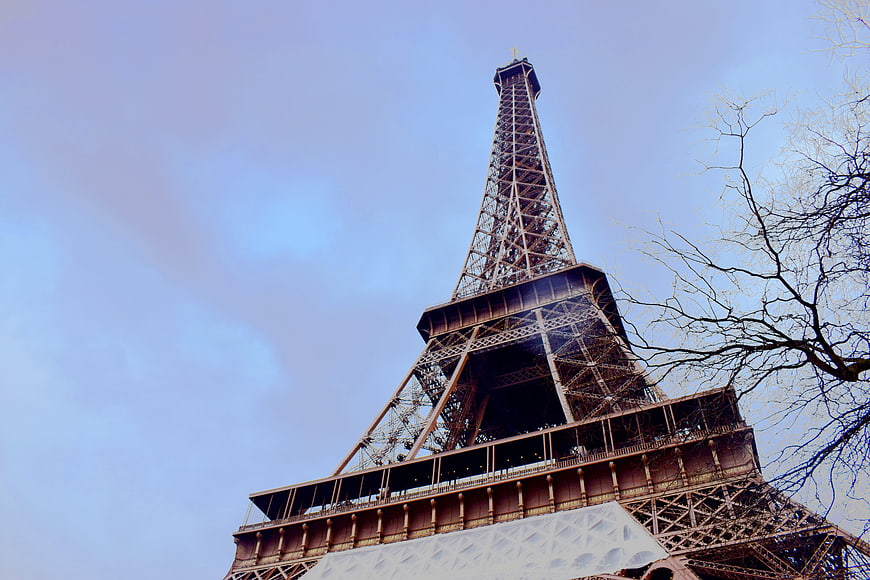 Low Angle View of Eiffel Tower Against Blue Sky
