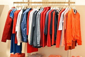 Colorful Men's Clothing on Rack in Retail Store