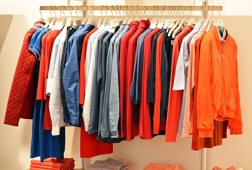 Colorful Men's Clothing on Rack in Retail Store