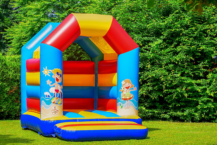 Colorful Inflatable Bouncy Castle In Garden