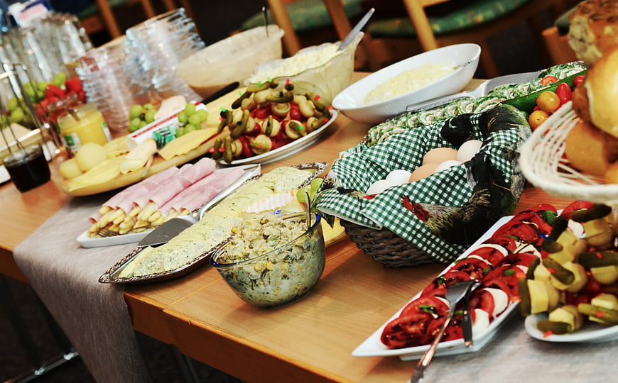 Colorful buffet table with breakfast and lunch food selection