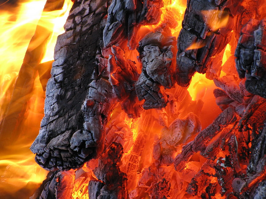 Close-up of burning charcoal and glowing embers